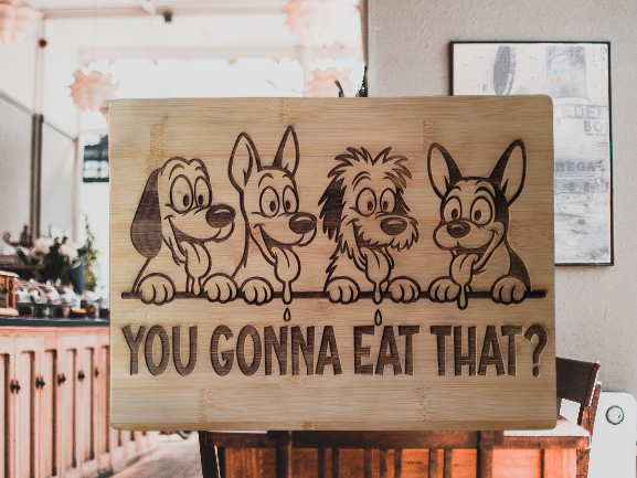 Four cartoon pups asking "YOU GONNA EAT THAT?"